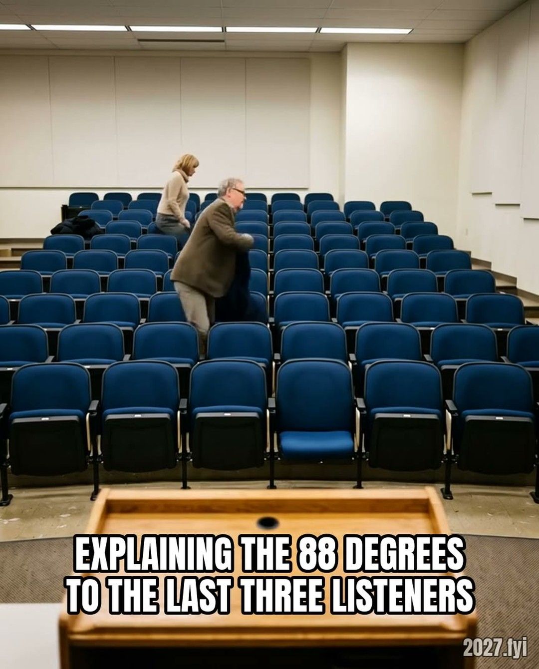 Seen from the lectern: the last three listeners in an almost empty lecture hall stand up, take their coats and leave one by one. Label: EXPLAINING THE 88 DEGREES TO THE LAST THREE LISTENERS