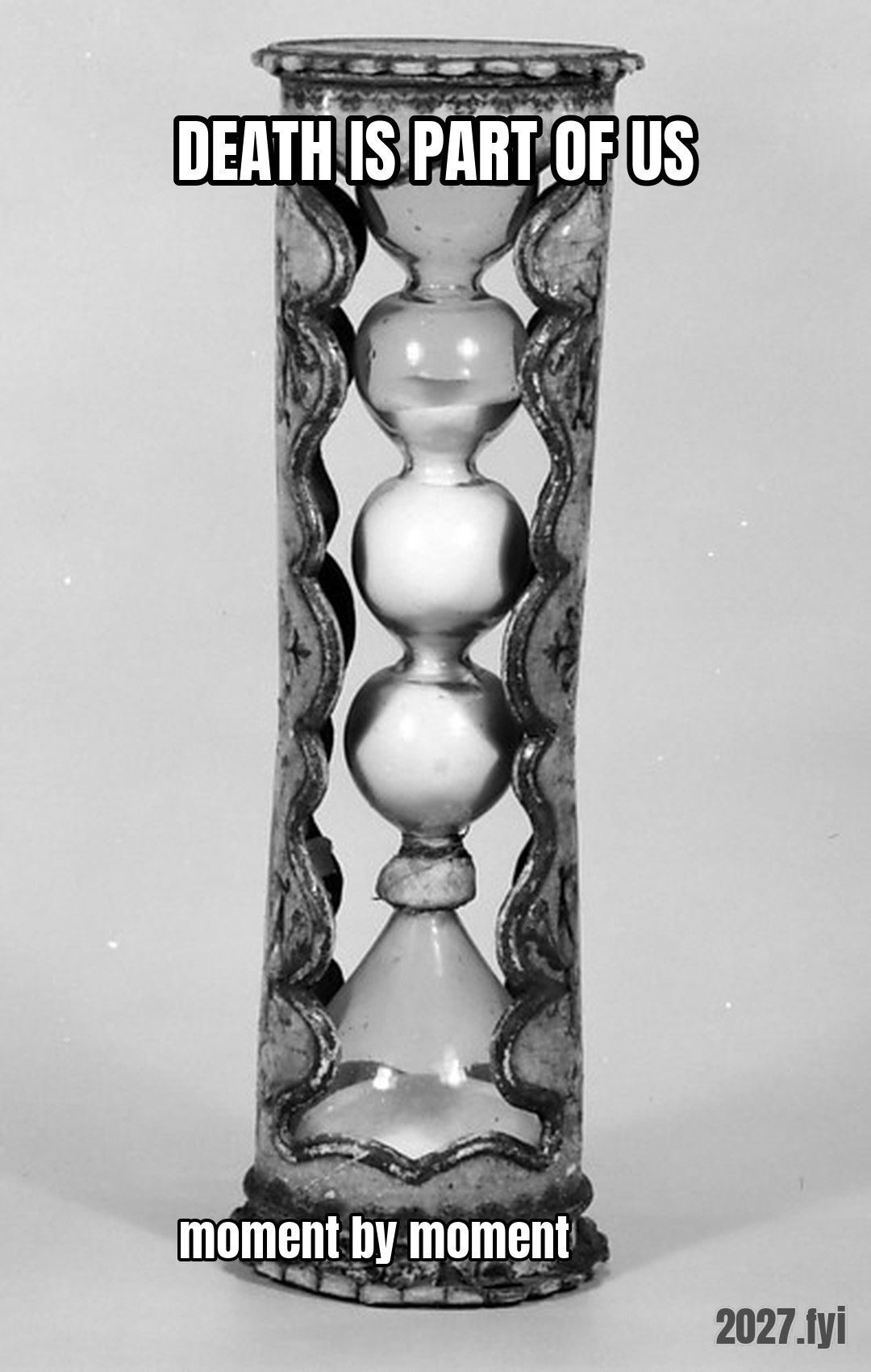 An 18th-century hourglass. DEATH IS PART OF US / moment by moment