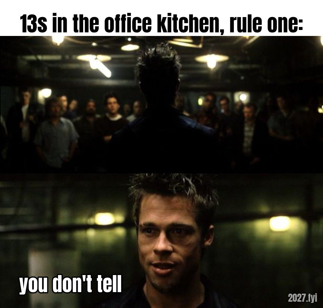 A man addresses a crowd in a dark basement. Labels: 13s in the office kitchen, rule one: / you don't tell