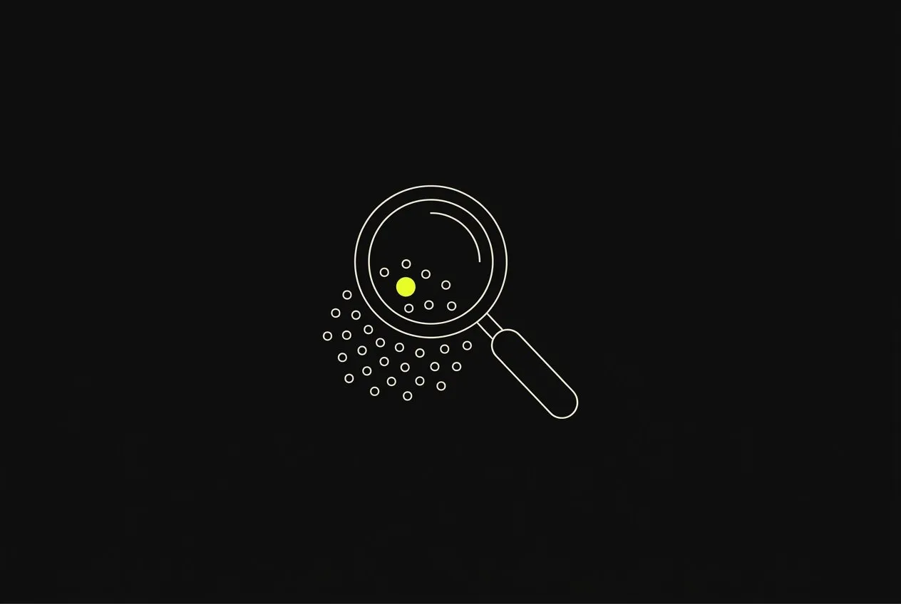 Line illustration: a magnifying glass hovering over a field of tiny dots, one dot acid yellow.
