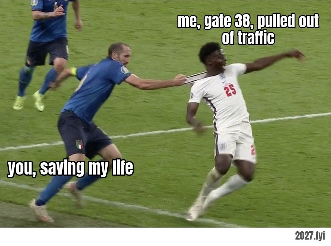 A footballer yanks an opponent back by the shirt collar. ra, doing the 38: "who the hell are you? don't do that again." / you, saving my life / me, gate 38, pulled out of traffic