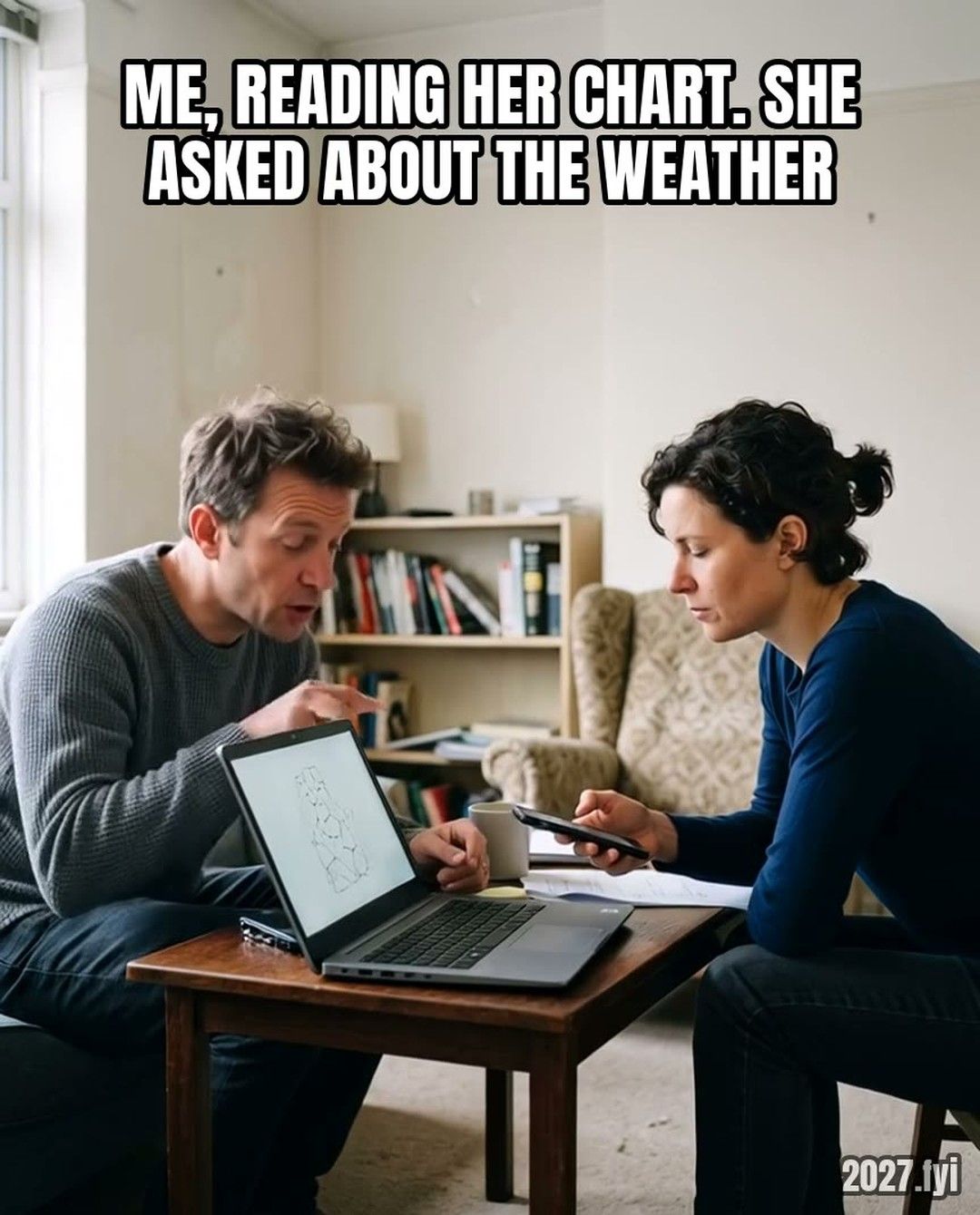 A man leans over his laptop and excitedly explains a bodygraph to a woman who keeps looking at her phone. Label: ME, READING HER CHART. SHE ASKED ABOUT THE WEATHER