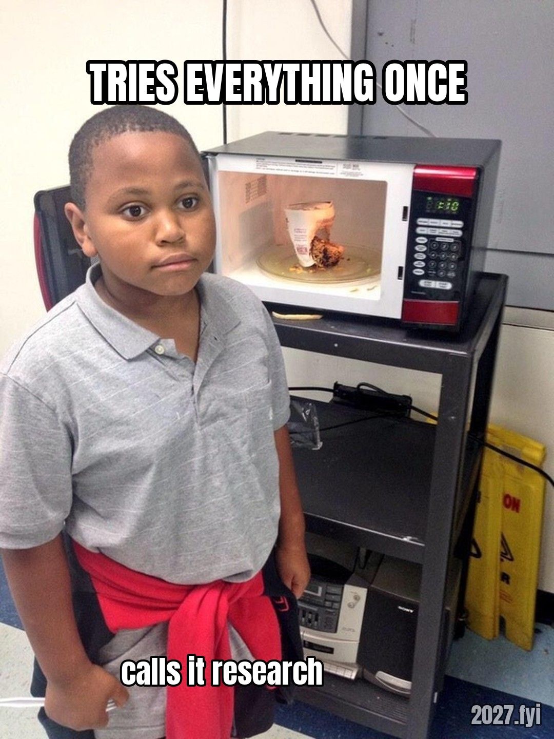 Minor Mistake Marvin next to a microwave mishap. TRIES EVERYTHING ONCE / calls it research