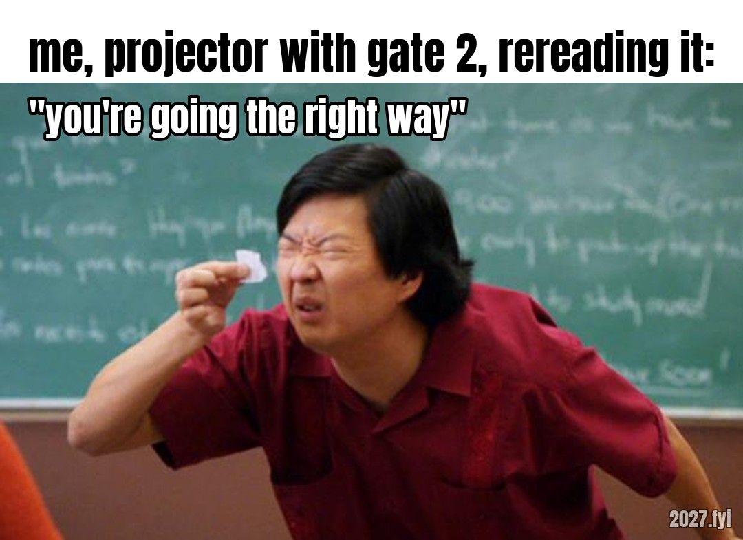 A man squints closely at a tiny piece of paper. Labels: me, projector with gate 2, rereading it: / "you're going the right way"